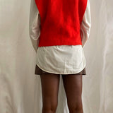 Red sweater vest
