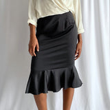 Black peplum skirt